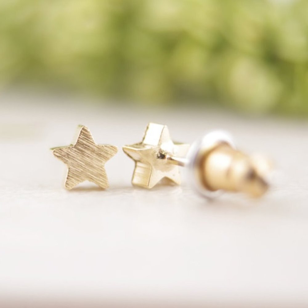 Star sky stud earrings gold tone brushed finish